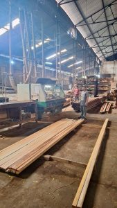 Wide view of Touchwood warehouse with timber inventory and production tools