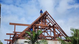 Ongoing installation of Merbau wood roofing in Seychelles by Touchwood crew