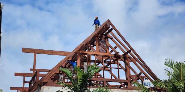 Ongoing installation of Merbau wood roofing in Seychelles by Touchwood crew