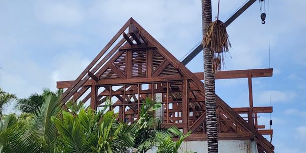 Ongoing installation of Merbau wood roofing in Seychelles by Touchwood crew