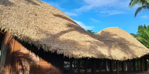 Side view of Fiji villa under construction with prefabricated cross-laminated timber roof and natural hardwood framing