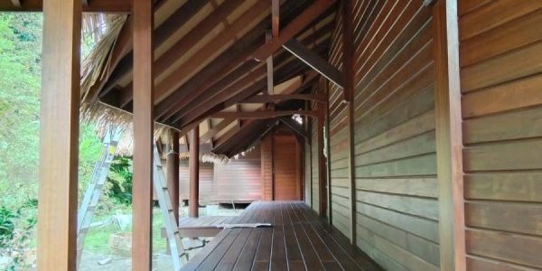 Close-up of engineered cross-laminated timber roof structure with organic curve installed by Touchwood